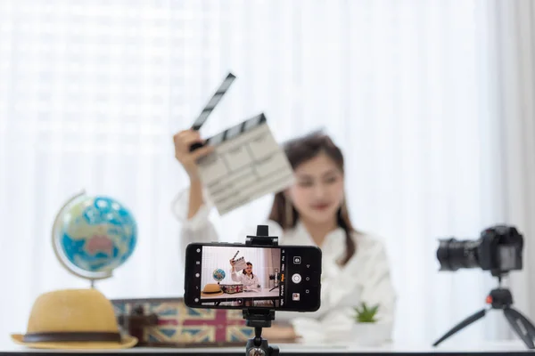 Young Asian woman as vlogger or blogger attending video conferen — Stock Photo, Image