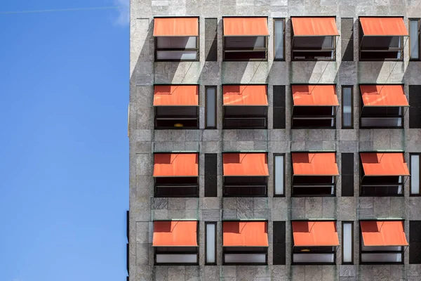 Red awnings on a building — Stock Photo, Image