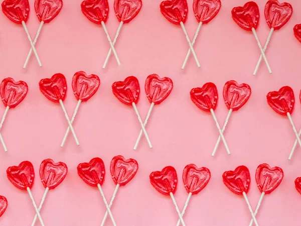 Twee Rood Hart Lollipop Patroon Roze Achtergrond — Stockfoto