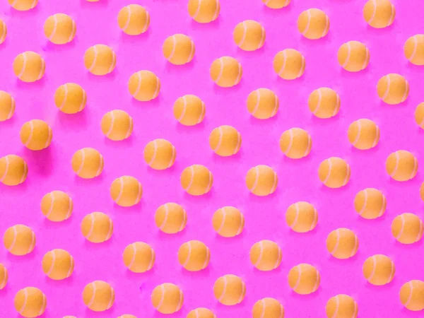 Žlutý Tenisový Míček Vzorek Růžovém Pozadí — Stock fotografie