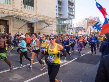 New York, United States - November, 4 - 2018 - People running the marathon clipart