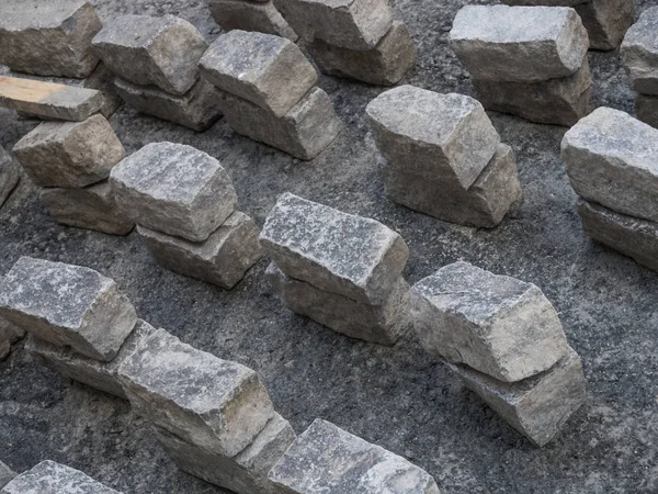 Grey stone bricks ready to place — Stock Photo, Image