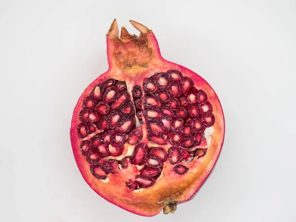 Half pomegranate isolated — Stock Photo, Image