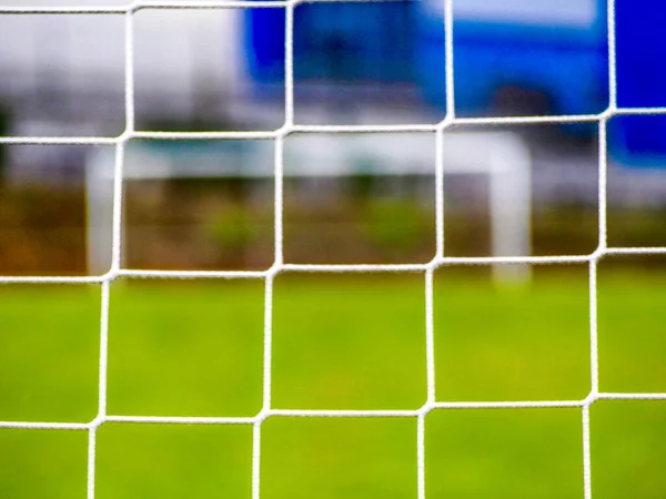 Foreground of football goal net