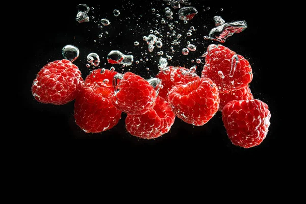 Raspberries Splashing Clear Water Isolated Black Background Healthy Fruits Concept — Stock Photo, Image