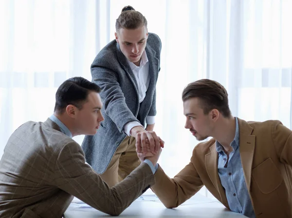 Business competition referee rivals  arm wrestling — Stock Photo, Image