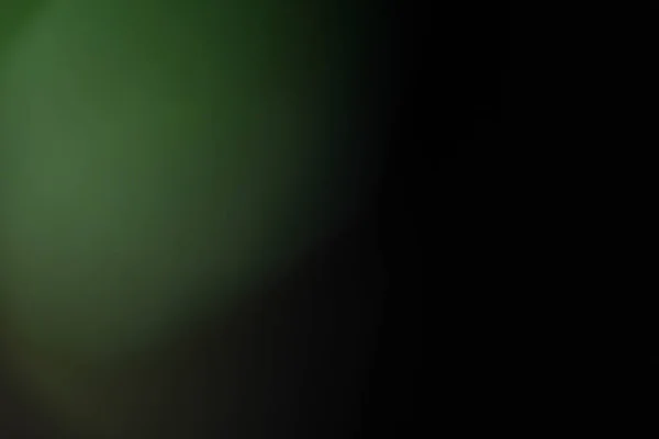 Wazig gloeiende groen licht lens flare zachte glans — Stockfoto