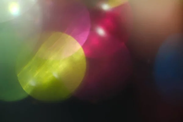 Objektif parlama renkli soyut bokeh ışık siyah — Stok fotoğraf