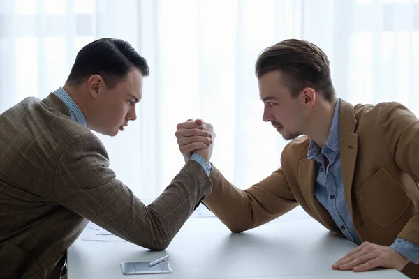 Business competition  arm wrestling focused men hands — Stock Photo, Image