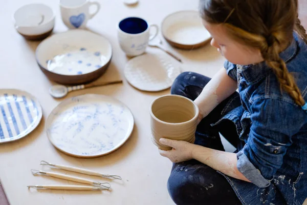 Child hobby pottery assortment handmade crockery — Stock Photo, Image