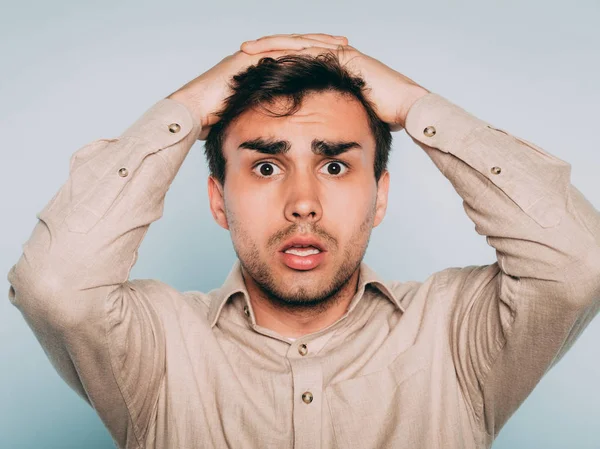 Terrified shocked alarmed man clutch head emotion — Stock Photo, Image