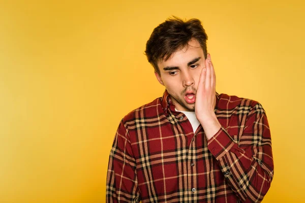 Shocked gobsmacked stressed man clutch face emotion — Stock Photo, Image