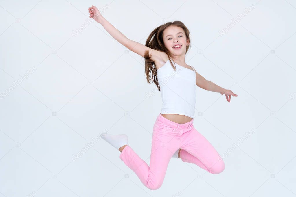 child jump high air freedom carefree happiness