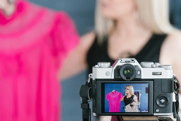 Clothing designer vlogging live streaming camera — Stock Photo, Image