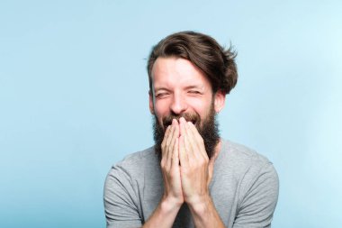 joyful excited happy man covering mouth emotion clipart