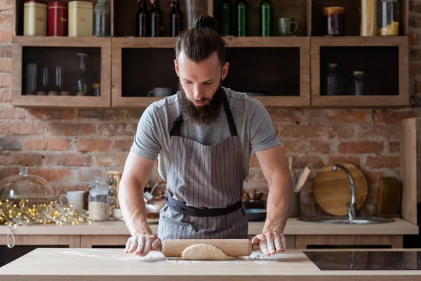 Pastry baker food preparing man rolling dough pin — Stock Photo, Image