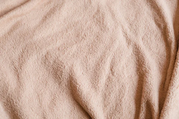 Crumpled rosa velo cobertor de tecido de pelúcia textura — Fotografia de Stock