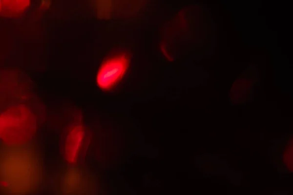 Lente abstracta llamarada fondo festivo borroso rojo —  Fotos de Stock