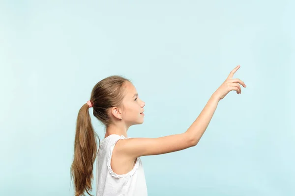 thoughtful girl reaching press virtual button