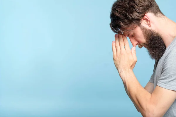 Man pray hands forehead spirituality faith belief — Stock Photo, Image