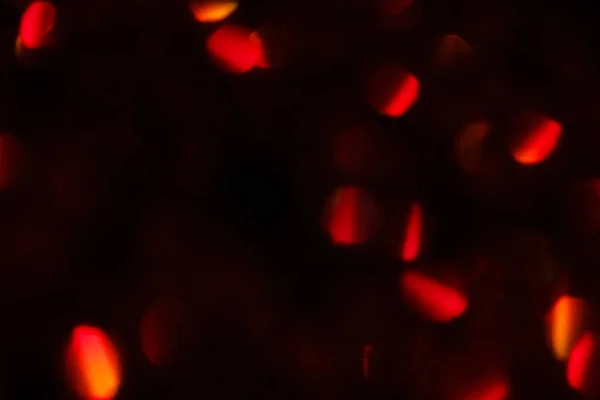 Abstracte flare achtergrond feestelijke rode vage lens — Stockfoto