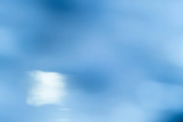 Nebesky modré měkké rozostření abstraktní zářící skvrny — Stock fotografie