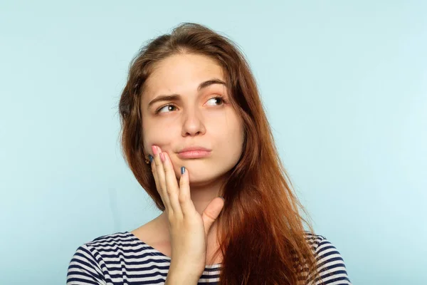Facial expression quizzical grumpy thoughtful girl — Stock Photo, Image