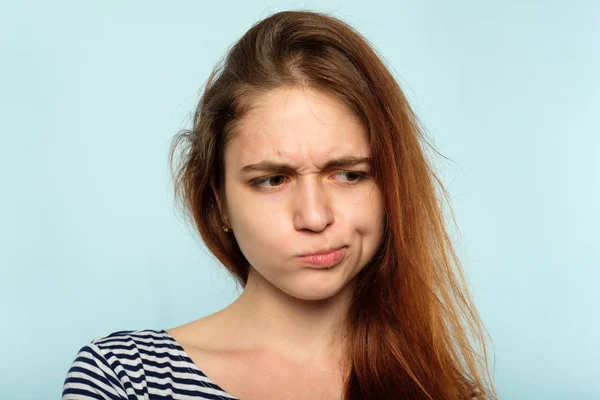 Displeased capricious moody girl pursed lips — Stock Photo, Image