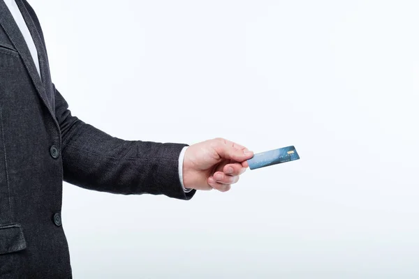 Tarjeta de crédito operación en línea transacción man hold — Foto de Stock