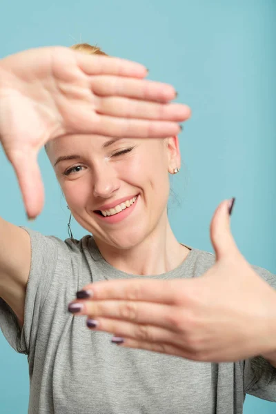 woman pretend take photo hands frame arts hobby