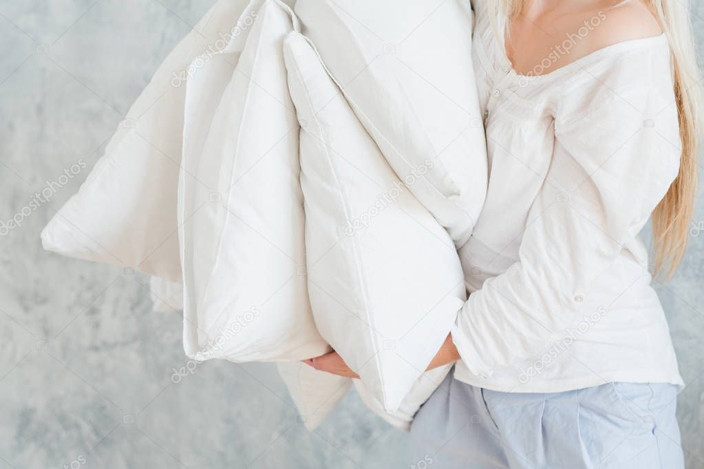 quality bedding sound sleep woman hold pillows