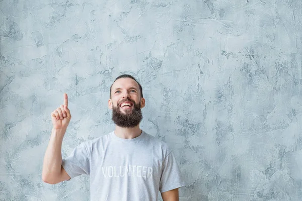 Volunteering modern lifestyle man index finger — Stock Photo, Image