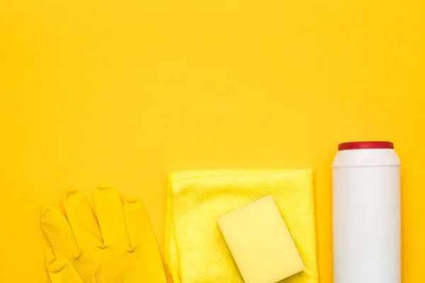 Home cleaning supplies row yellow copy space — Stock Photo, Image