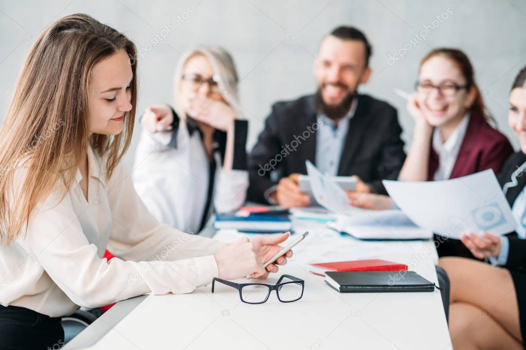 business meeting paperwork daydreaming colleague