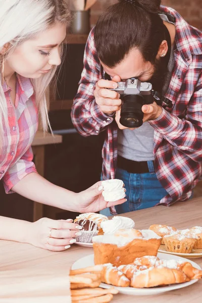 food photographer man assistant cakes pastries