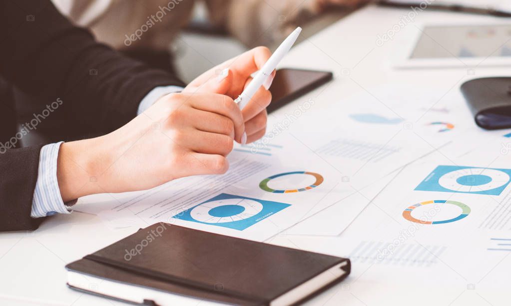 business meeting analysis paperwork female hands