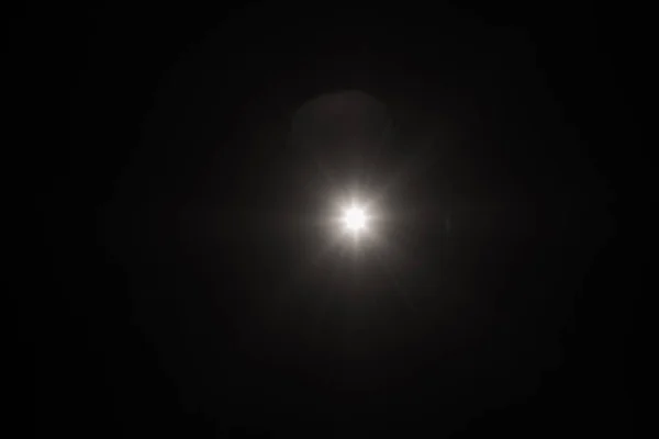 フラッシュ スパーク ブラック レンズ フレア スポット ライト グロー効果 — ストック写真