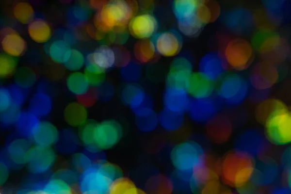 Defocuse night city lights multiple colorful spots — Stock Photo, Image