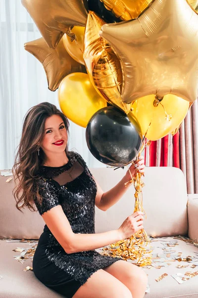 special occasion happy brunette girl balloons