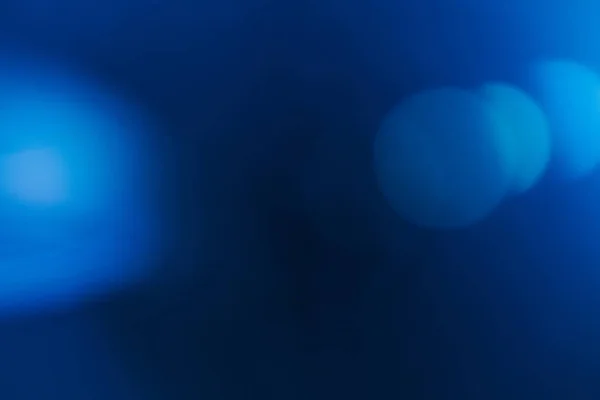 Lentille fusée éclairante flou bleu fond abstrait — Photo