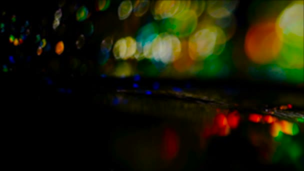 Lente de colores llamarada noche ciudad cartelera luces — Vídeo de stock