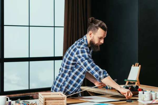Artist workplace bearded painter tools inspiration — Stock Photo, Image
