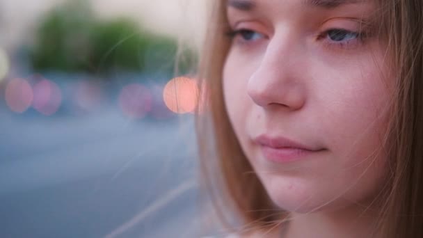 Pensive dreamy young woman closeup portrait — Stock Video