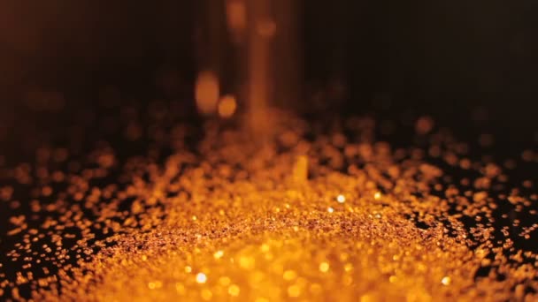 Brillo de oro caer brillo brillante decoración bokeh — Vídeos de Stock