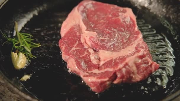 Food cook red meat beef steak frying grilled pan — Stock Video