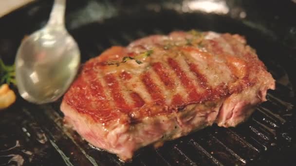Seasoned red meat sirloin pork chop steak cooking — Stock Video