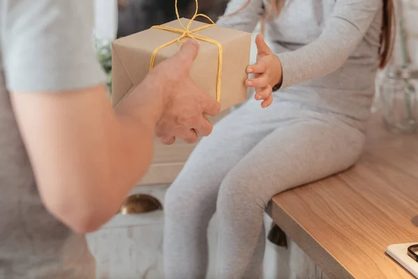 family special occasion girl receiving gift