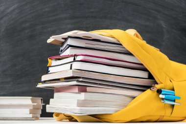 information overload backpack books chalkboard clipart