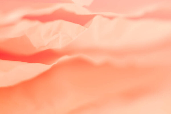 pale coral red crumpled paper layers background