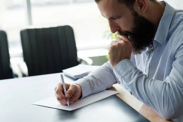 Corporate life paperwork concerned business man — Stock Photo, Image